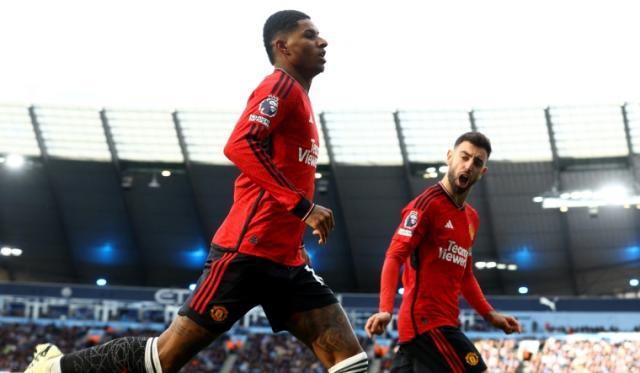 1709512453178046794.jpg marcus-rashford-celebrates-scoring-their-first-goal-with-bruno-fernandes-reuters.jpg